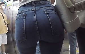 Candid a slim Asian girl round tight jeans