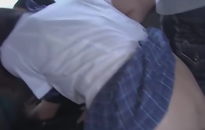 Japanese legal age teenager gets drilled on the bus around a bukkake belt