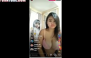 Chubby asian almost big tits dancing