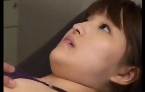 Japanese In Douse Suit Gets Tits Massaged
