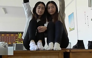 Double Chinese girl feet tickling