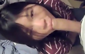 Trained asian teen swallow