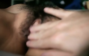 Closeup be advantageous to a Hairy and Bedraggled Oriental Pussy