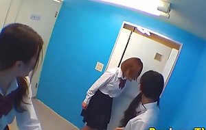 Oriental legal age teenager urinate alongside water-closet