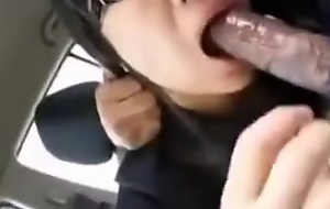Bespectacled Oriental Teen In A Car Gives BJ Like A Bitch