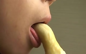 Gorgeous Japanese cutie sexily eating a banana