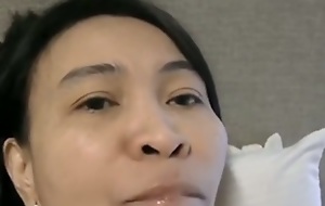 Asian mature woman sucking my hose