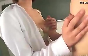 Horny MILF School Teases and Sucks her 2 Teenage Students' Cocks inside the Classroom